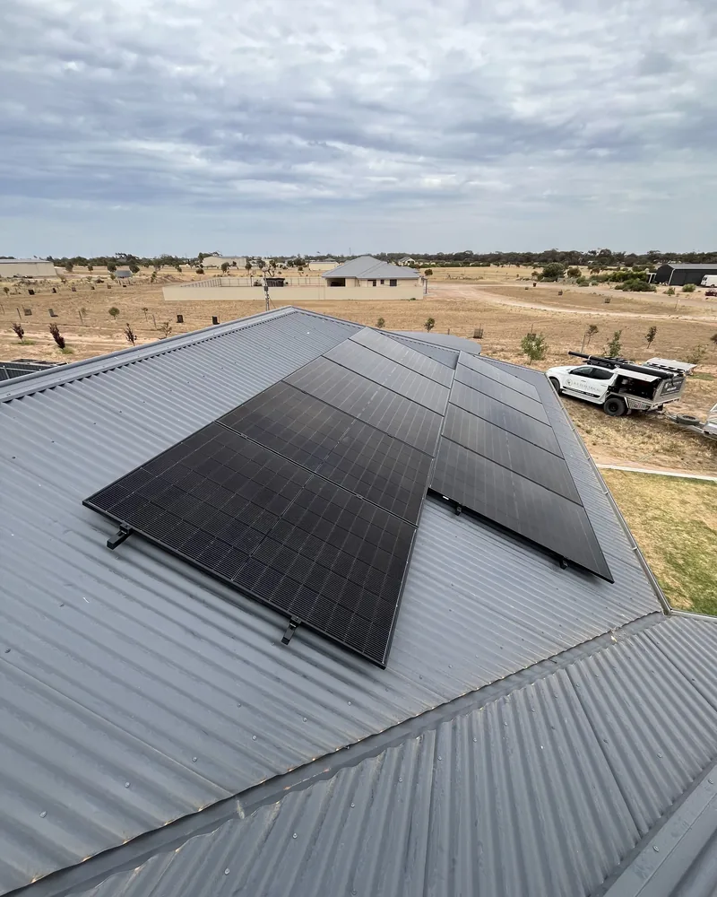 The branded B.E Electrical ute on a rooftop solar install in rural South Australia